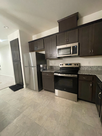 Brand new kitchen appliances and dedicated cabinet spaces - Gated Community – Newly Built Shared Housing Just 2 Miles from UC Merced House