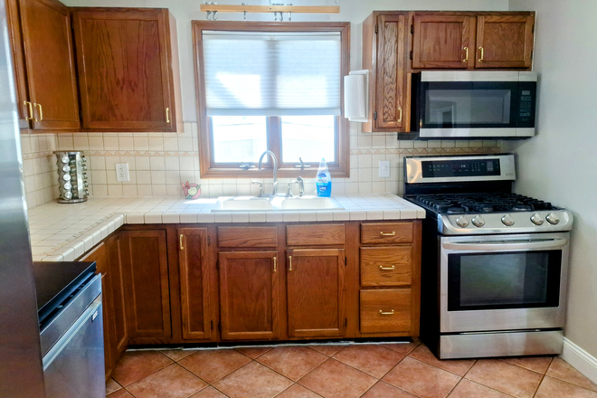 Photo - 3-Bedroom 1.5-Bath Duplex in East Providence, minutes from Brown University - Seconds from I-195 Duplex