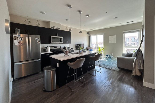 kitchen and living room - Observatory Flats Condo