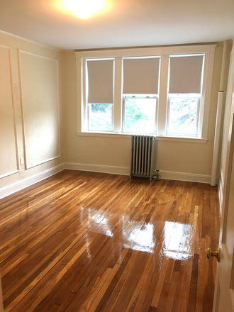 Visit hubrealtyproperties.com - Beautiful 2 bedroom split apartment on Chiswick Rd T stop Green Line