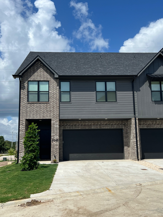 Front View - The Urban - New, Luxury Townhome!! Close to Campus/on bus route. Looking for two female roommates