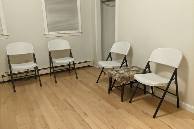 Living room - Delightful 2 bedroom condo! In unit washer dryer, dishwasher, yard, storage, and more!