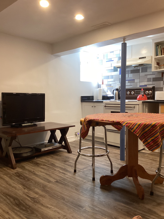 kitchen/living room - Furnished 1 Bedroom Basement Apartment