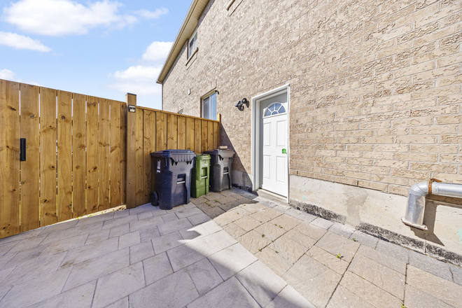 Separate Entrance - Spacious Partially Furnished 3-Bedroom Walkout Basement Apartment