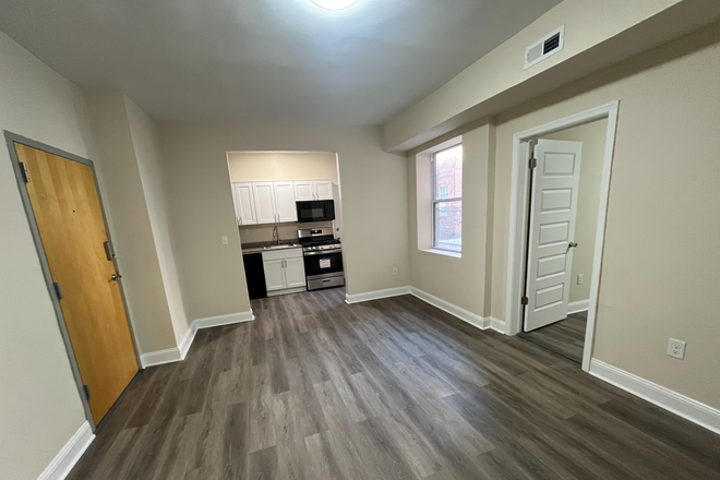 1124/4 - entrance/living area - Find Your Perfect Fit — 1 & 2 Bedroom Apartments Near VCU