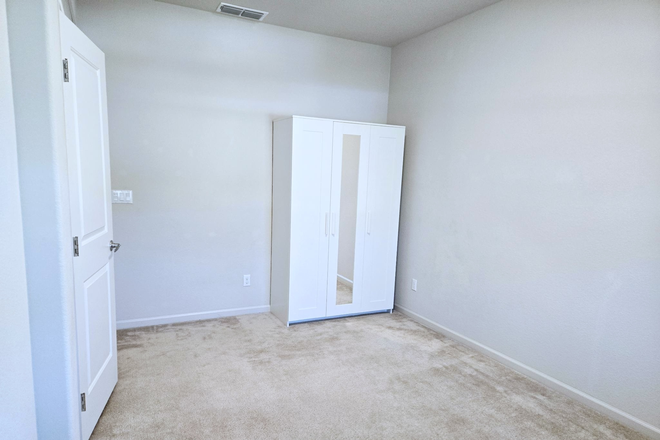 12x10 Bedroom Angle 1 - Bedroom with Hallway Private Bathroom