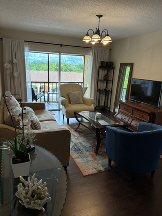 Living Room - Comfortable Suite in Spacious 2-Bedroom Apartment, right across FAU (whole unit available)