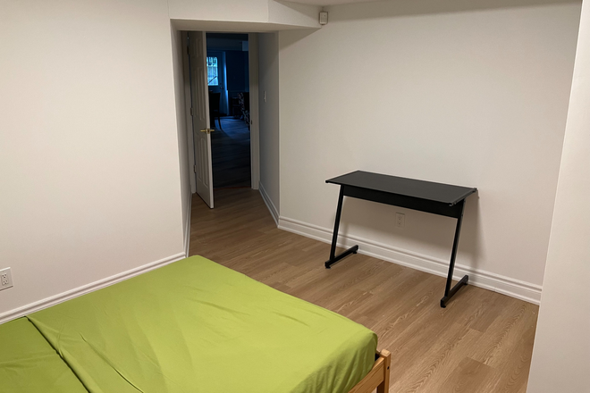 View from inside bedroom into the common area. - For Girls: Safe Furnished 3 Bed rooms + kitchen/Laundry in house near U 0f T