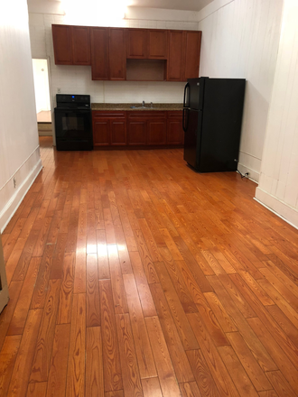 living - 615 S 52nd Street, 1st floor, large 2 bedroom apartment.