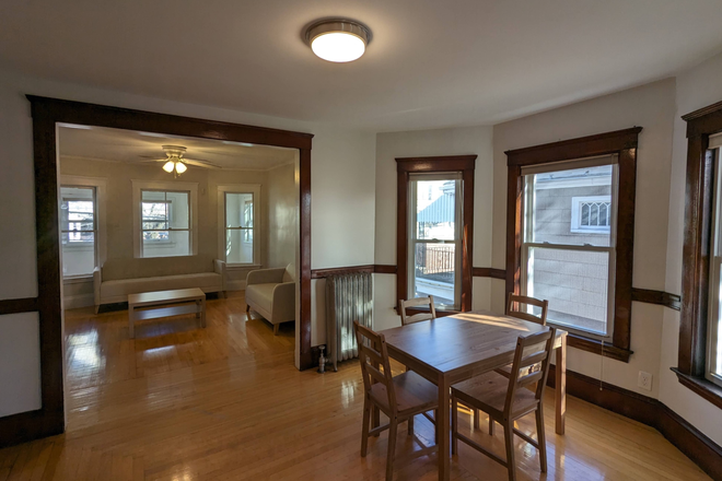 Dining Room(+included furniture) - Spacious 4 bed 2 bath Condo Between Davis Square and Tufts