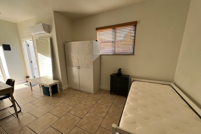 Living space - Cozy, Updated & Furnished Studio Near UM *All Utilities & Cable TV/WiFi Included* Apartments