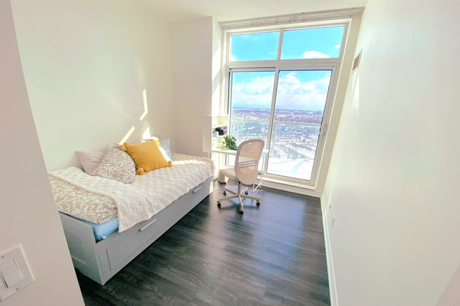 Bedroom w/ access to balcony - UTSC: 1 Bedroom w/ Self Washroom in Sunny 2-RM Condo. High Floor. 3 mins walk STC. All Utilities In