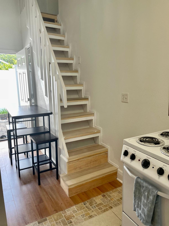 Stairway to bedroom - Home with separate Two level apartment 1bed 2 baths in quiet neighborhood 2-3 miles from campus.