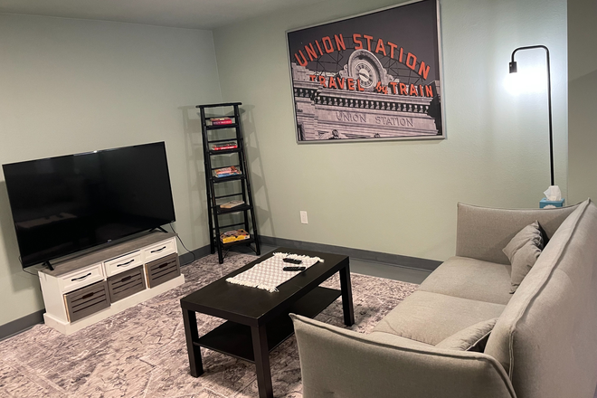 private living room with 55 inch smart tv. - Quiet Fully furnished all inclusive Basement by DU House