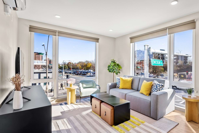 Living Room - Best Buddies Living at 525 LINC Apartments