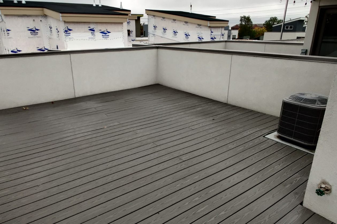 Roof Deck - Room for rent in 3 bedroom/2.5 bath townhouse across from Regis