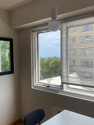 view from dining area - Spacious, bright, freshly renovated and furnished studio in convenient location Condo