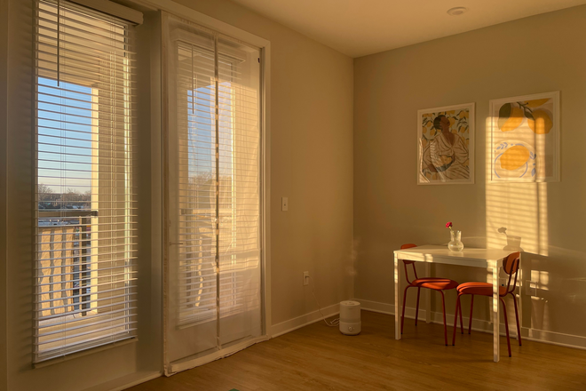Dining area next to the living room (Sun coming in in the afternoon) - Avalon Durham Apartments