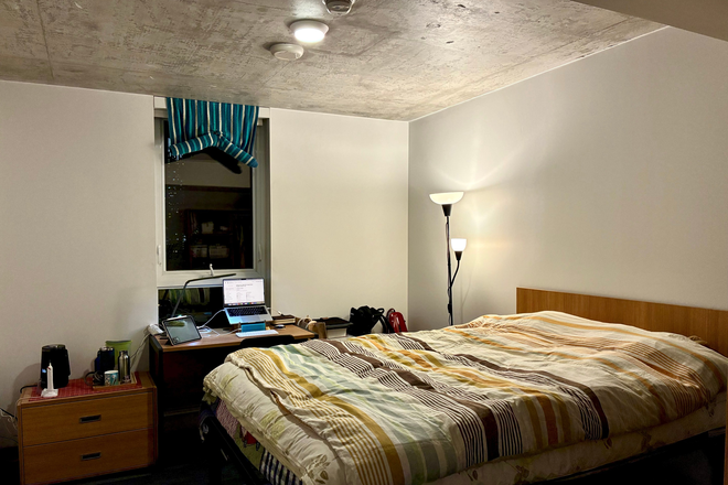 Bedroom - CampusOne | A Furnished Bedroom with Kitchen, Living Room, and Breakfast Meal Plan