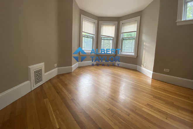 Living Room - Low-Budget 4 bedroom on Parker Hill Terrace!! Apartments