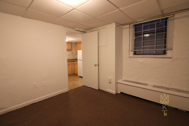 living room - Spacious basement 2 bed - landlord pays fee, one month free! Apartments