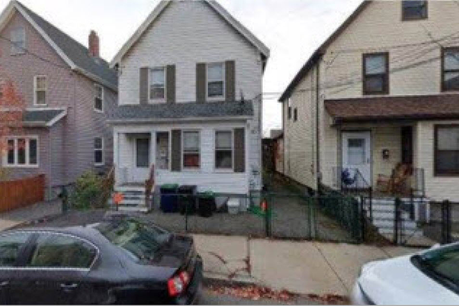 the white house on the left - Single family house, 6 rooms, 4 bedrooms, back yard, quiet one-way side street.