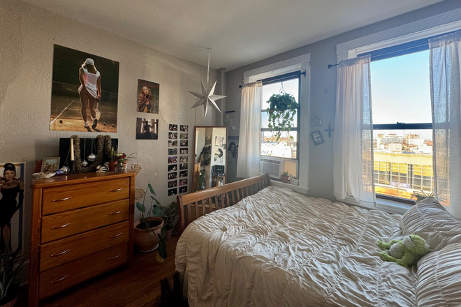 Mirror, dresser, TV - 1056 Commonwealth apartment building