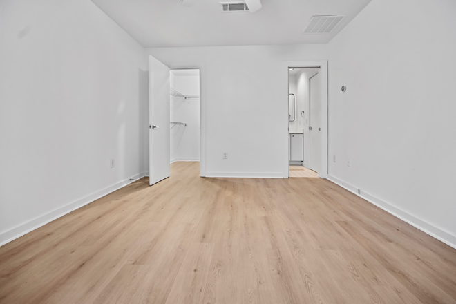 First floor bedroom (with walk-in closet and bathroom access) - 2 bedroom Townhouse Loft on the Beltline