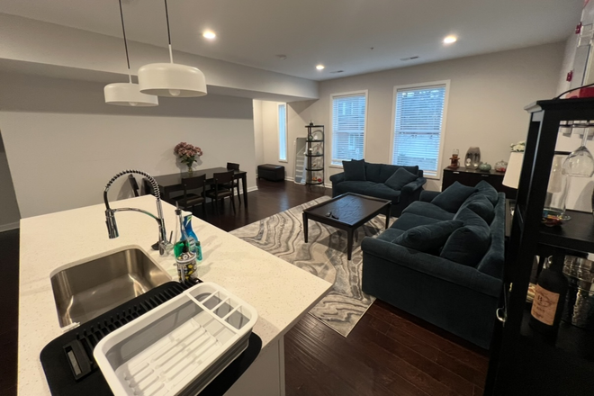 Living Room - Urban Oasis Hideaway Apartments