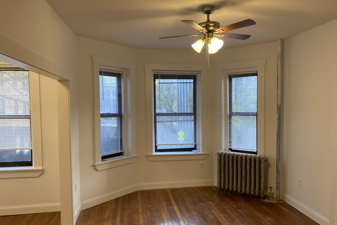 Bedroom - NEW front Facing Alcove Studio Across NEU Best Deal 9/1/26 Apartments