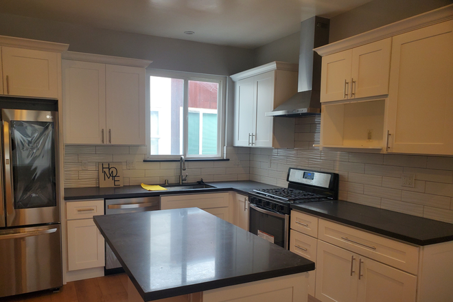 Kitchen - Wonderful Room Available in Large Remodeled Top Floor Flat Apartments