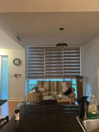 Living area - Slightly furnished townhouse with three bedrooms and two bathrooms, and a kitchen.
