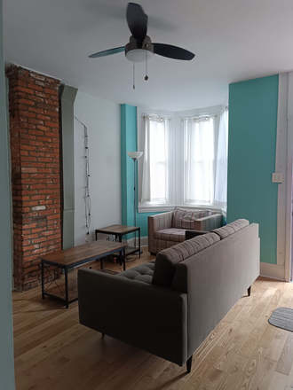 Living room - couch, chair, table, lamps - Powelton Village 2 bedroom, furnished, quiet, sunny, walk or bike to campus House