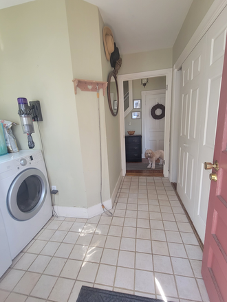 rear entrance with laundry - 3-BR cottage in Wickford Village, No. Kingstown. Walk to beach, shopping and bus. House