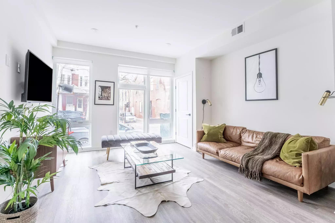 living area - 3BR/3Ba w Shared Patio - Stylish Furnished West Powelton Apartment - Flexible Lease - Available Now