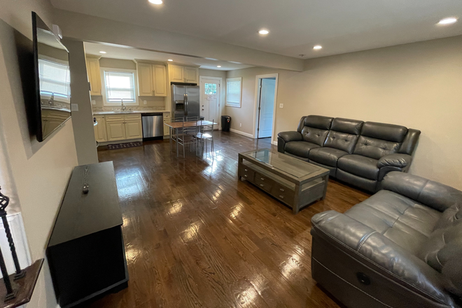 Living Room - Still Available 6/1/26! Newly Renovated 7 Bedroom and 3 Bath House