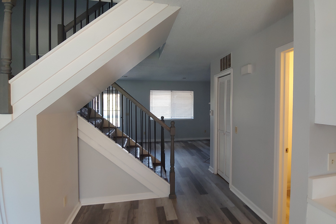 Staircase and Living Room - Brand New Remodeled 2 bedroom/2 Bathroom - 3460 Colorado Ave B12 Apartments