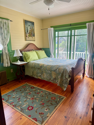 Bedroom with Double Doors to Balcony with View of Back Garden - Charming 1Bdrm Apt Avl 8/15+Deck+Balcony;Utilities/Wifi Incd Furnished