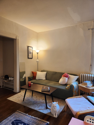 Living Room - Sublet Room in Apt, Just Steps from GU Campus! Mid June-September