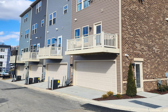 Exterior Rear - Former Model Home for Rent at Belcrest.  5BR, 5BA, 2334 Sq Ft Townhome, $3900/month