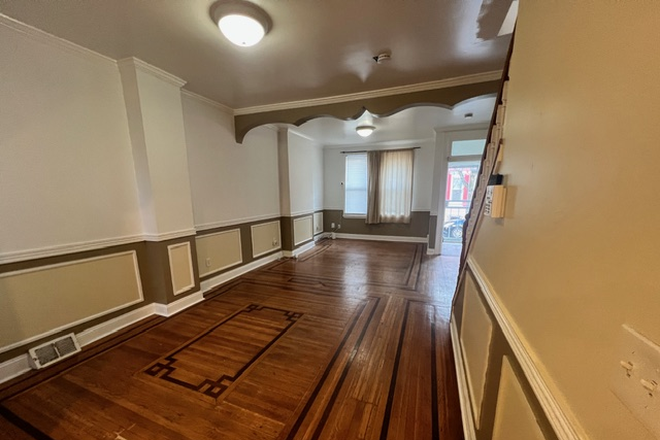 Living Room and Dining Room - Charming 4-Bedroom Apartment near Temple