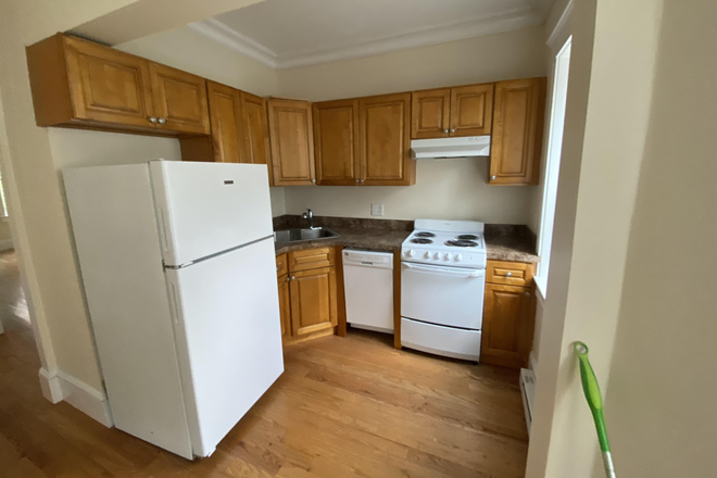 Visit hubrealtyproperties.com - Excellent 2 bedroom with newly updated kitchen and breakfast bar, on the green line T Apartments