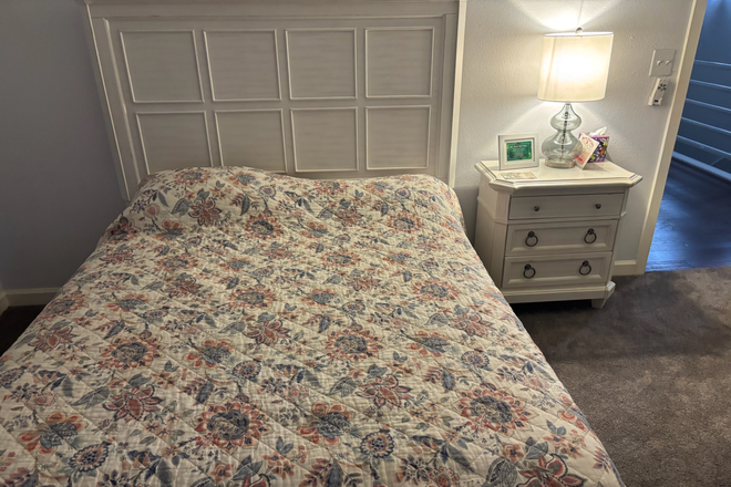 2nd Bedroom.  Queenn sized bed.  Includes a full bath and closet.  Larger dresser. - Courtyards Condo