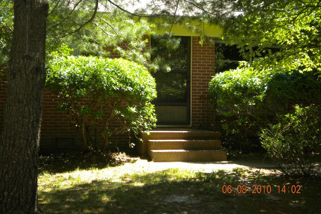 Front door of home in Williamsburg. - Winston Drive House