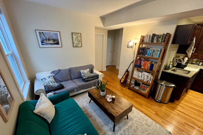 Living Room - Sunny Master Bedroom and Bath in Riverside Apartments