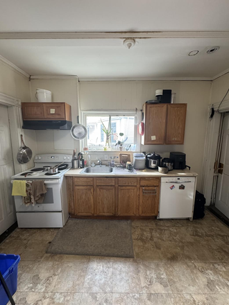 kitchen space with stove, dishwasher, full sized sink and more! - Massive Single Family Home!!! 7 bed/ 3 bath available 09/01/2025