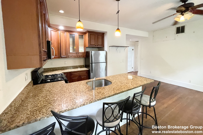 kitchen - Spacious and Sunny 4 bed 1 bath apartment! Laundry in unit, Central A/C