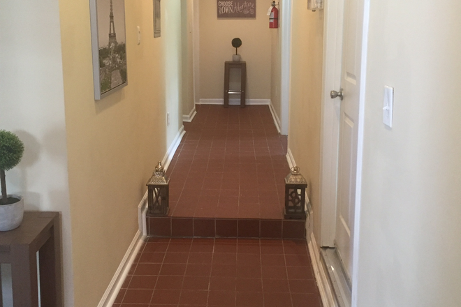 Hallway access to room - Private Room & Bath, cleaning service, parking,  all utilities included. 4 Bedrooms total Apartments