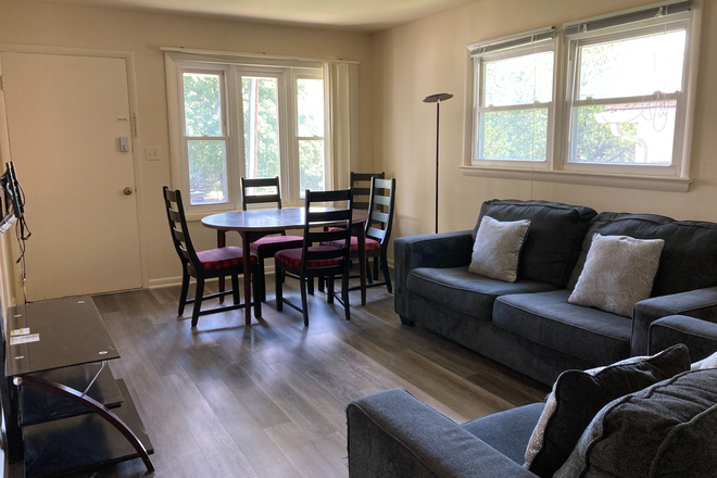 Living Room & Dining Area - 5 Bedroom 2 Full Bath Partially Furnished House Steps from UMD Shuttle Bus Stop