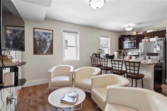 Living room and kitchen - Furnished Condo 3 Min Walk to Brown University Prime Location with Parking